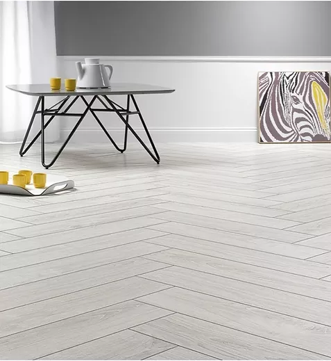 Wooden effect floor in herringbone style pattern